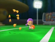 Oona right near the circle of fish