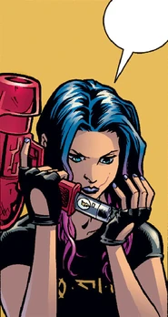 Melaka loads a cartridge.