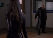 At Wolfram & Hart, Spike tests Illyria's powers.