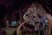 The Land Squid size compared to the miniture characters