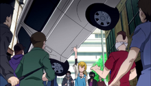 Kenji lifting up a whole car