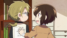 Dazai sticks a note at Kunikida's back (Wan! Anime)