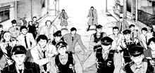 Ranpo and Minoura defended by some of the police (manga)