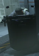 Al-Qatala fighter wielding a Riot Shield.