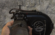 Aiming down the MG 15's iron sights.