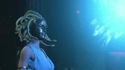 Medusa witnessing the vision in the Eternal Flame.