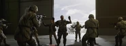 Raptor-One and the strike team are captured once again, this time by the Director's agents.