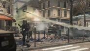 A RPG-7 projectile flies through the air in the streets of Paris.