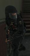 An FSB operator wielding a SPAS-12.