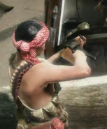 A Viet Cong fighter firing at downed SOG operatives.