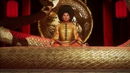 Pam Grier meditating in her dojo.