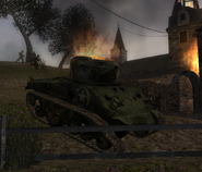 A destroyed Sherman tank