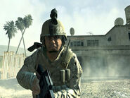 A Marine and Vasquez run through the streets.