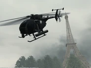 An MH-6 Little Bird flying over the map.