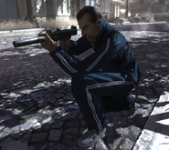 Zakhaev kneeling and wielding a suppressed Mini-Uzi