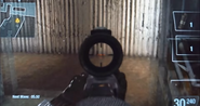 Aiming down the ACOG Scope on the Carbine.