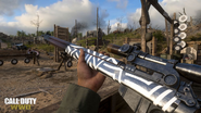 The Lee Enfield with a custom camouflage.