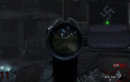 The Swarovski on the AUG-50M3, note the yellow lens.