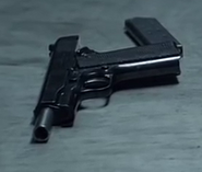 Soap's M1911 with the slide pulled back and magazine removed