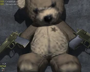 Мишка с двумя золотыми "Диглами" на карте Lockdown