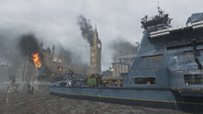 The ship beside the Palace of Westminster and Big Ben.