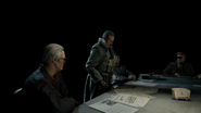 Key members of Perseus such as Anton Volkov, Robert Aldrich, Vadim Rudnik, Arash Kadivar (not pictured here) and Bell gathered in a meeting as Perseus explains his goals to detonate the Greenlight nuclear arsenal.