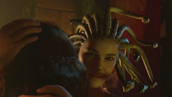 Medusa holding Scarlett.
