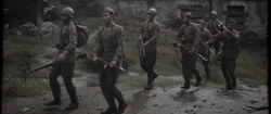 A Soviet soldier (second to the left) holding a PPSh-41 in the intro cinematic for Die Maschine.