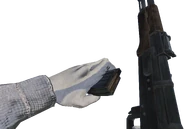 Reloading the AK-47. Notice the cartridge in the magazine is in 2D.