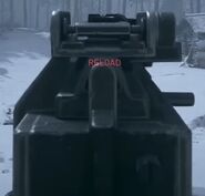 Aiming down the M1919's iron sights.