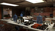 Kitchen turned into a bomb crafting room, C4 can be seen among various other explosives.