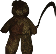 A teddy bear holding a Sickle.