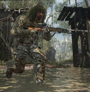 An S.O.G operative w/ Ghost running with a M14 w/ ACOG Scope