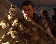 The Player in the reveal trailer holding a BRM and has a shorter hairstyle.