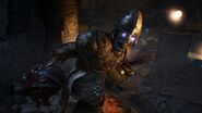 A blue-eyed zombie wearing Medieval armor in Origins