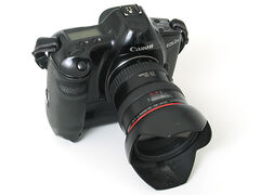 Canon EOS1N 1.jpg (132 KB) Canon EOS-1N with Power Drive Booster E1 and Canon Zoom Lens EF 20-35mm 1:2,8 L.