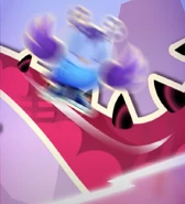 Odus sliding on Denize's tail in the Ice Cream Games, which seems impossible to do safely due to his skate blades and her dorsal spikes