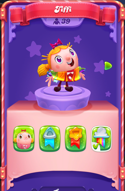 a) Candy Crush Saga visual interface; (b) Tiffi character