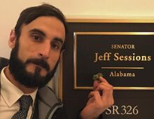 Nikki Allen Poe and Senator Jeff Sessions sign 2