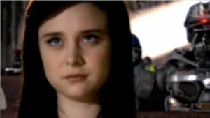 A vision of Zoe appears in the Virtual World Cylon church.