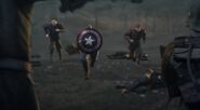 Captain America charging with the Howling Commandos