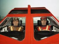 Captain Brown and Captain Scarlet aboard the Spectrum Patrol Saloon they were in when they were killed as normal Earthmen.