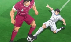 Blocking Nagano's tackle with his body