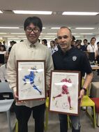 Takahashi with Andres Iniesta, Japan, 2018-05-28