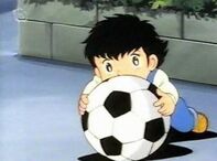 Tsubasa at a very young age, with his best friend