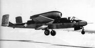 T2-489, taking off (or landing) at Muroc Flight Test Base with test pilot Lt. Bob Hoover at the controls