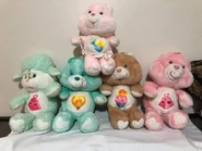 Baby Tugs's Belly Badge on Baby Hugs, Lotsa Heart's Belly Badge on Gentle Heart, Bright Heart's Belly Badge on Bedtime, Birthday's Belly Badge on Tenderheart, and Lotsa Heart's Belly Badge on Love-a-Lot