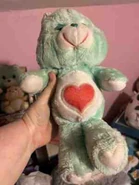 Tenderheart Bear's Belly Badge on Bedtime Bear