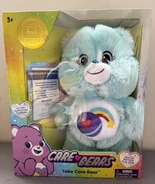 Play-a-Lot Bear in a Take Care Bear box