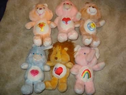 Swift Heart's Belly Badge on Cheer, Bedtime's Belly Badge on Tenderheart, Gentle Heart's Belly Badge on Swift Heart, Cozy Heart's Belly Badge on Brave Heart, and Cheer's Belly Badge on Lotsa Heart